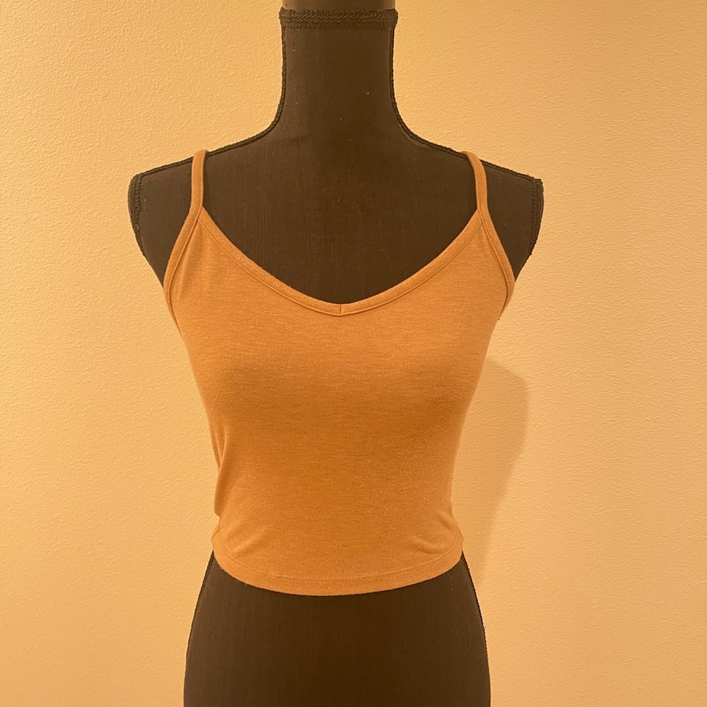 Forever 21 Women’s XS cropped tan tank top.